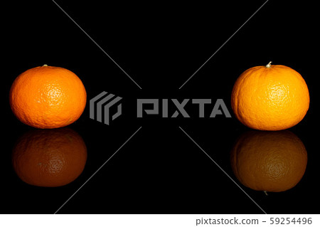 Fresh orange mandarine isolated on black glass Fresh orange mandarine isolated on black glass 59254496