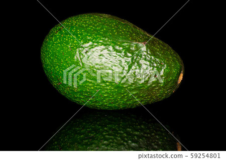 Fresh green avocado isolated on black glass Fresh green avocado isolated on black glass 59254801