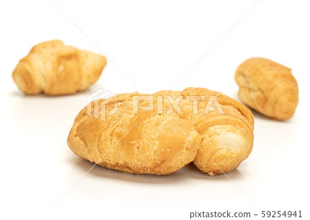 Fresh mini croissant isolated on white 59254941