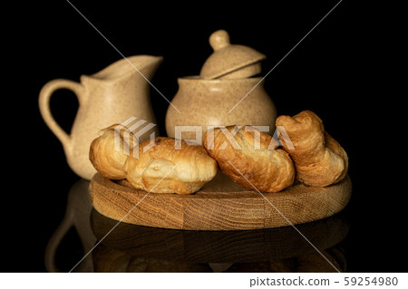 Fresh mini croissant isolated on black glass 59254980