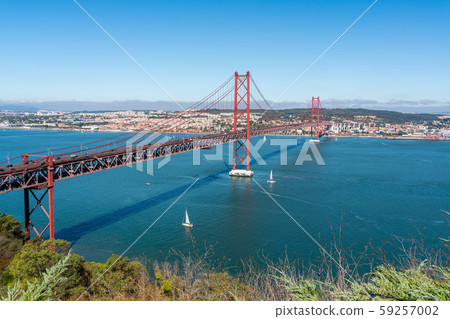 April 25 bridge with a view of Lisbon, in the summer. Portugal. 59257002