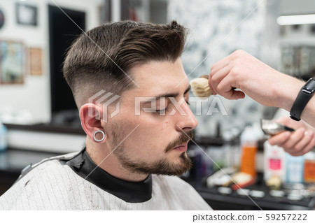 Haircut and beard haircut in barbershop. Man haircut 59257222