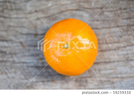 Fresh orange fruit on wooden background 59259338