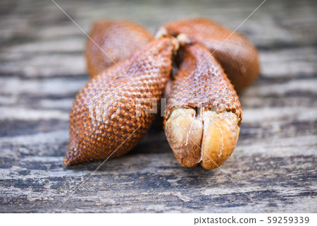 Salak on wooden background - Salak tropical fruit 59259339