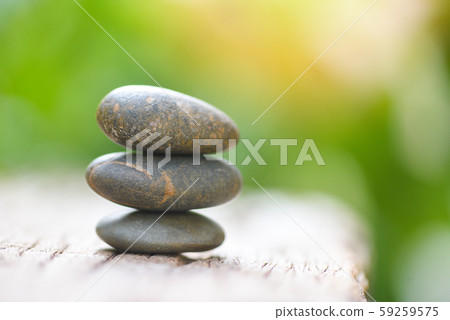 Natural wellness concept - Relax zen stones stack Natural wellness concept - Relax zen stones stack 59259575