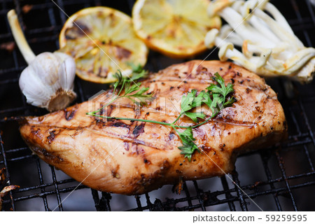 Chicken breast grilled with garlic chilli herbs Chicken breast grilled with garlic chilli herbs 59259595