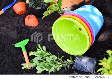 Gardening tools on soil background ready to Gardening tools on soil background ready to 59260225