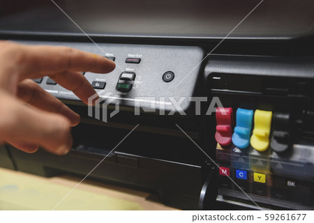 Copier concept - Business man hand press button on Copier concept - Business man hand press button on 59261677