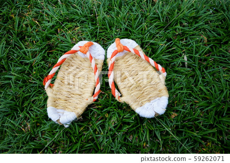 A small grass basket placed on the lawn A small grass basket placed on the lawn 59262071