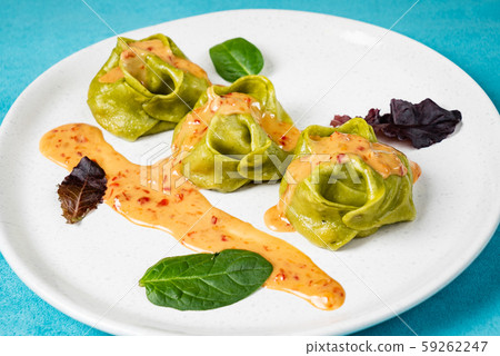 Manti is a type of dumpling popular in most Turkic cuisines, 59262247