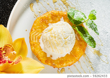 fried pineapple with ice cream 59262433