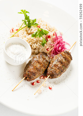 mutton kebabs with rice and sauce mutton kebabs with rice and sauce 59262499