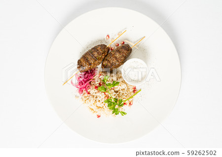 mutton kebabs with rice and sauce mutton kebabs with rice and sauce 59262502