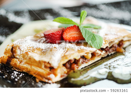 apple strudel with vanilla cream 59263161