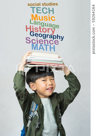 'Back to school' A lovely little boy holding his lesson books on his head with graphic show main subjects for school kids. Education, Smart, Child development, Genius, Intelligent, High-IQ concept 59264164