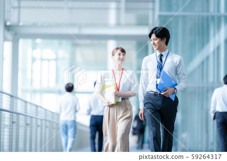 Business image Male employee Female employee 59264317