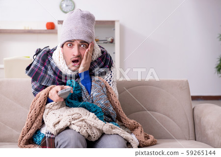 Young man suffering at home 59265144