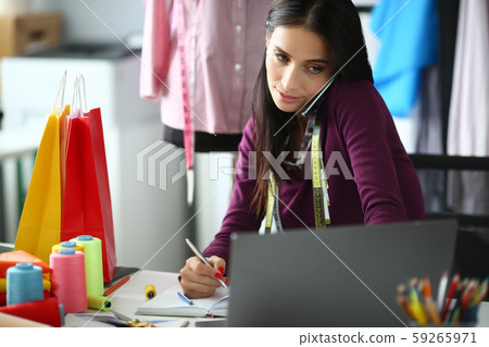 Serious tailor businesswoman 59265971