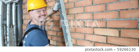 Cheerful smiling constructor 59266130