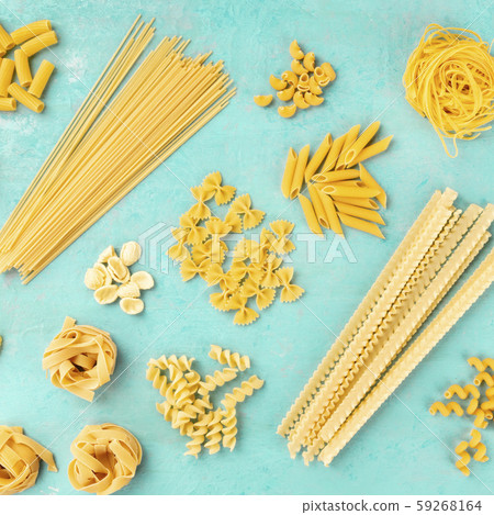 Italian pasta, square overhead shot, a flat lay on a blue background. Spaghetti, penne, farfalle 59268164