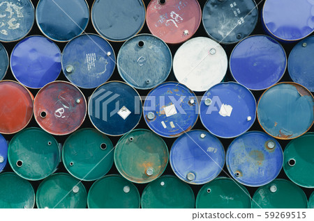 Old chemical barrels. Steel oil tank. Toxic waste. 59269515