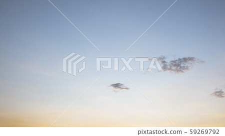 Beautiful view of sky and cloud at dusk,Sky Bright Blue Orange And Yellow Colors in twilight after sunset time. 59269792