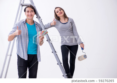 Young family doing renovation at home Young family doing renovation at home 59270265