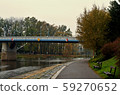road bridge over river with promenade along the river 59270652