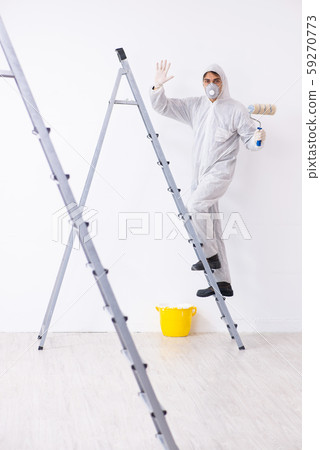 Painter working at construction site 59270773