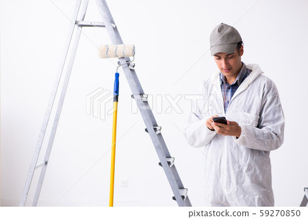 Painter working at construction site Painter working at construction site 59270850