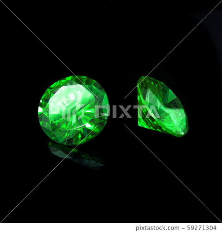 Tsavorite Garnet on a black background Tsavorite Garnet on a black background 59271304