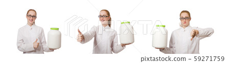 Young female doctor holding jar of protein isolated on white Young female doctor holding jar of protein isolated on white 59271759