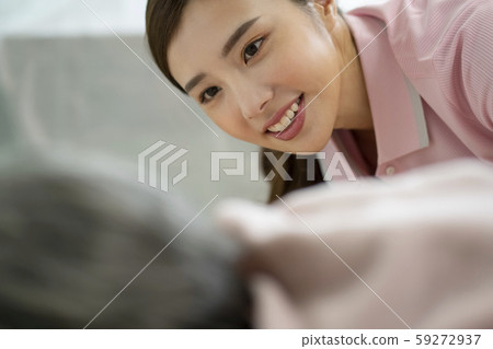 Female caregiver hospital 59272937