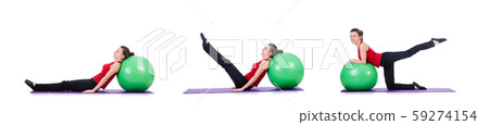 Young woman with ball exercising on white Young woman with ball exercising on white 59274154