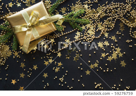 Border of golden gift box on black background. 59276759