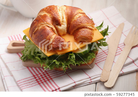 Croissant sandwich with cheddar cheese, cucumber, Croissant sandwich with cheddar cheese, cucumber, 59277345