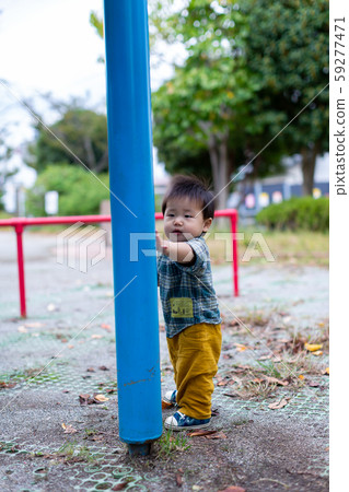 Infants playing in the park 59277471