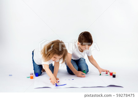 Two pretty child friends boy and girl are drawing pictures by paints Two pretty child friends boy and girl are drawing pictures by paints 59278475
