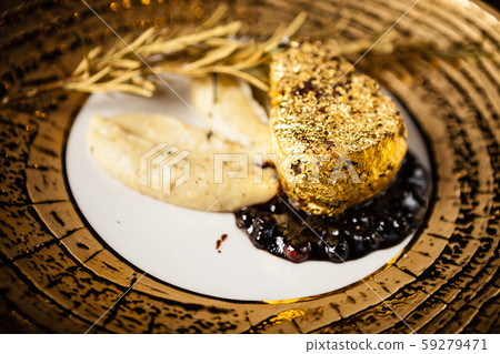 Black Angus tenderloin steak covered with 24 carat gold Black Angus tenderloin steak covered with 24 carat gold 59279471