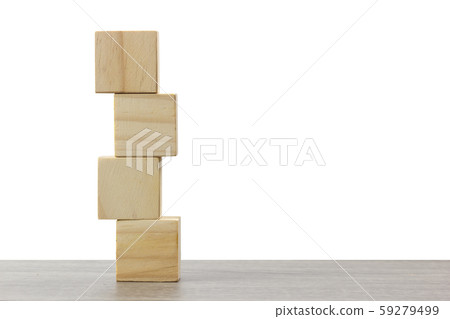 stack of wooden block on wood table against white stack of wooden block on wood table against white 59279499