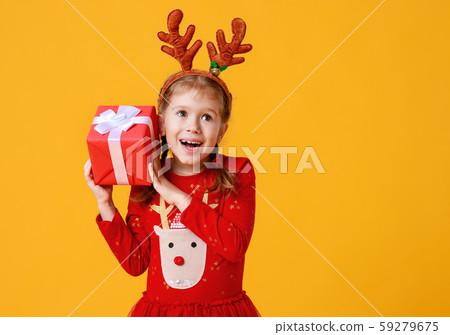 happy funny child girl in red Christmas reindeer 59279675