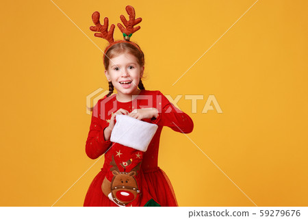 happy funny child girl in red Christmas reindeer 59279676