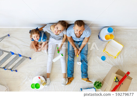 Repair in apartment. Happy family mother, father 59279677