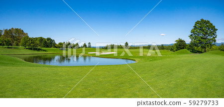 A golf course where the ponds and bunkers look stunning. A golf course where the ponds and bunkers look stunning. 59279733