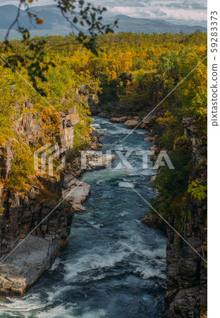 Beautiful view to river in Abisko national park Beautiful view to river in Abisko national park 59283373