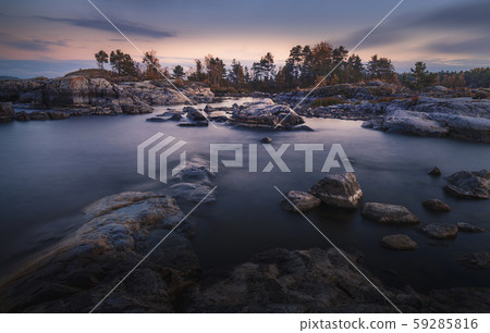 Moody sunrise over northern shore with dramatic Moody sunrise over northern shore with dramatic 59285816