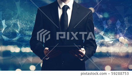Businessman holding a tablet 59288753