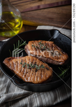 grilled duck breast meat with skillet 59289190