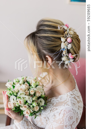 Beautiful woman in wedding dress in photo studio. Beautiful woman in wedding dress in photo studio. 59289685