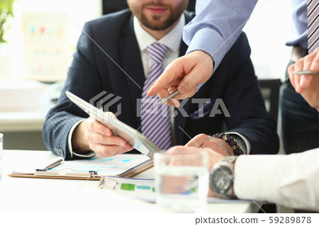 Business people discuss contract Business people discuss contract 59289878